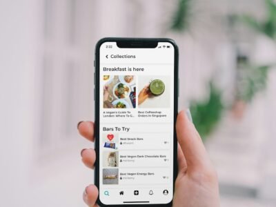 Hand holding a phone running an ordering app